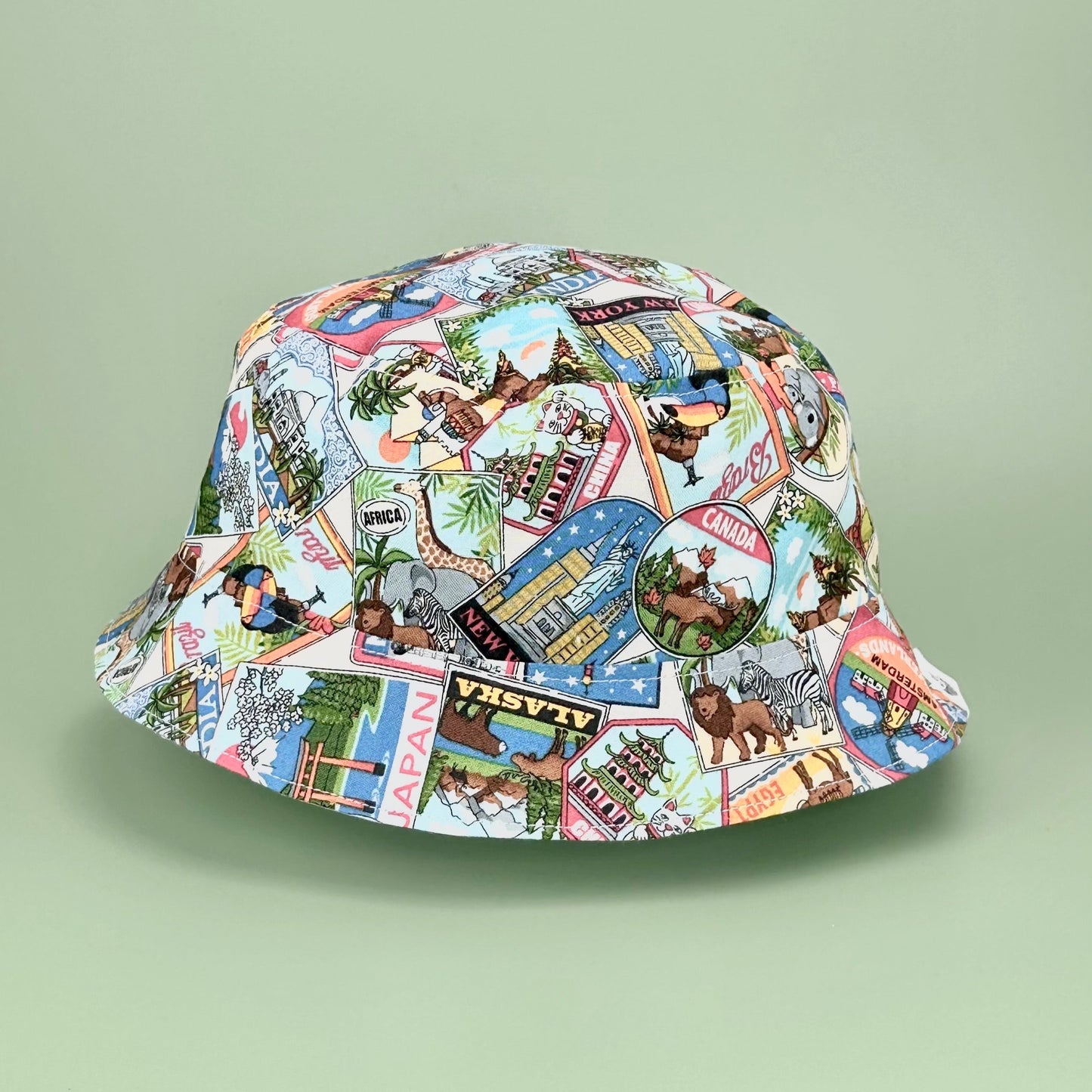 Age 3 Years, Reversible, travel/safari design bucket hat. (One Only!)